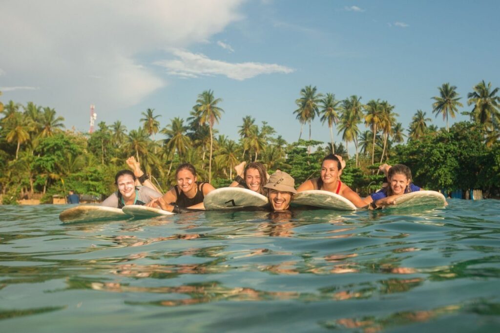 Talalla Surf Camp Surf Coach with Guest in Water